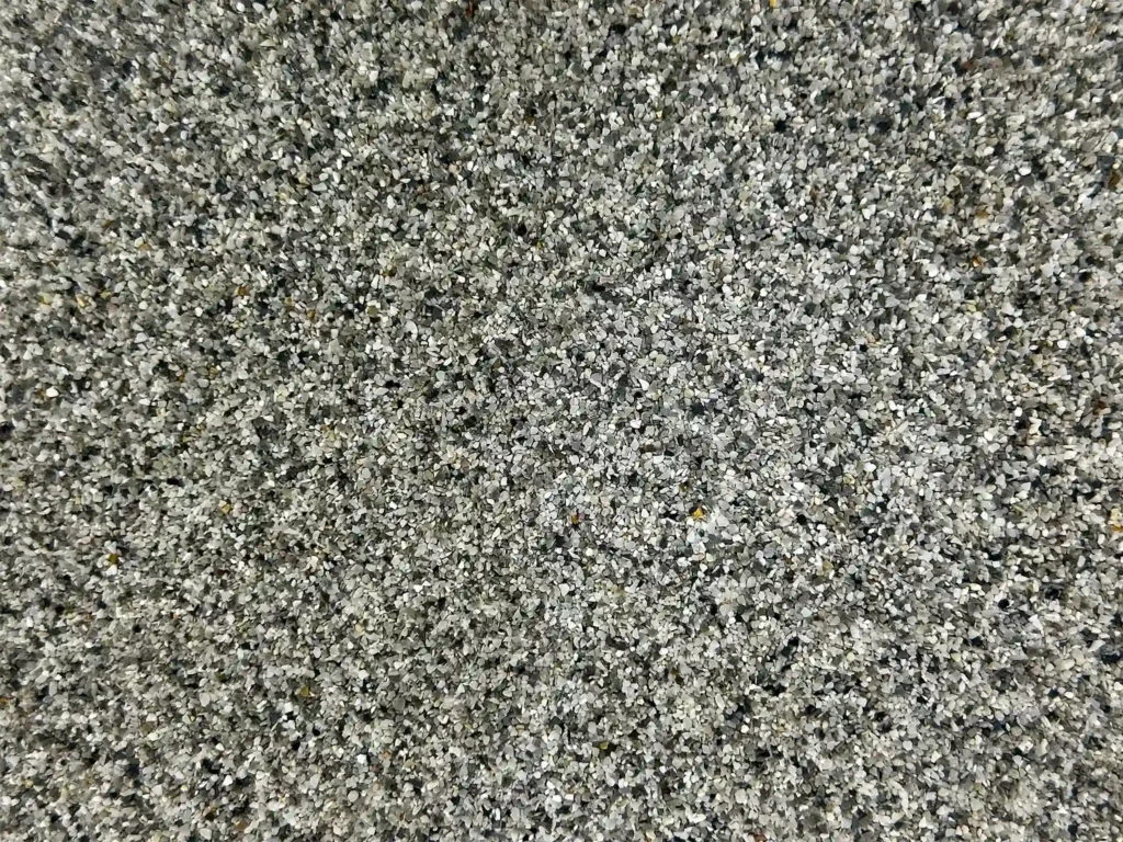 A close-up view of Slate Quartz Pool Pebble.