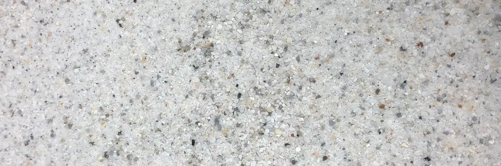 A close-up view of Premier White sand.